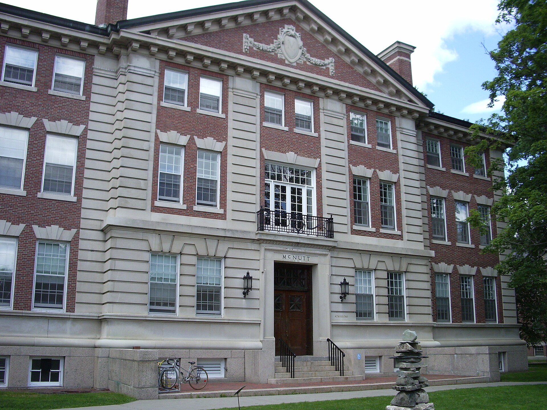 Historic brick buildings on the Dartmouth College campus surrounded by greenery, representing the college financial aid appeal process