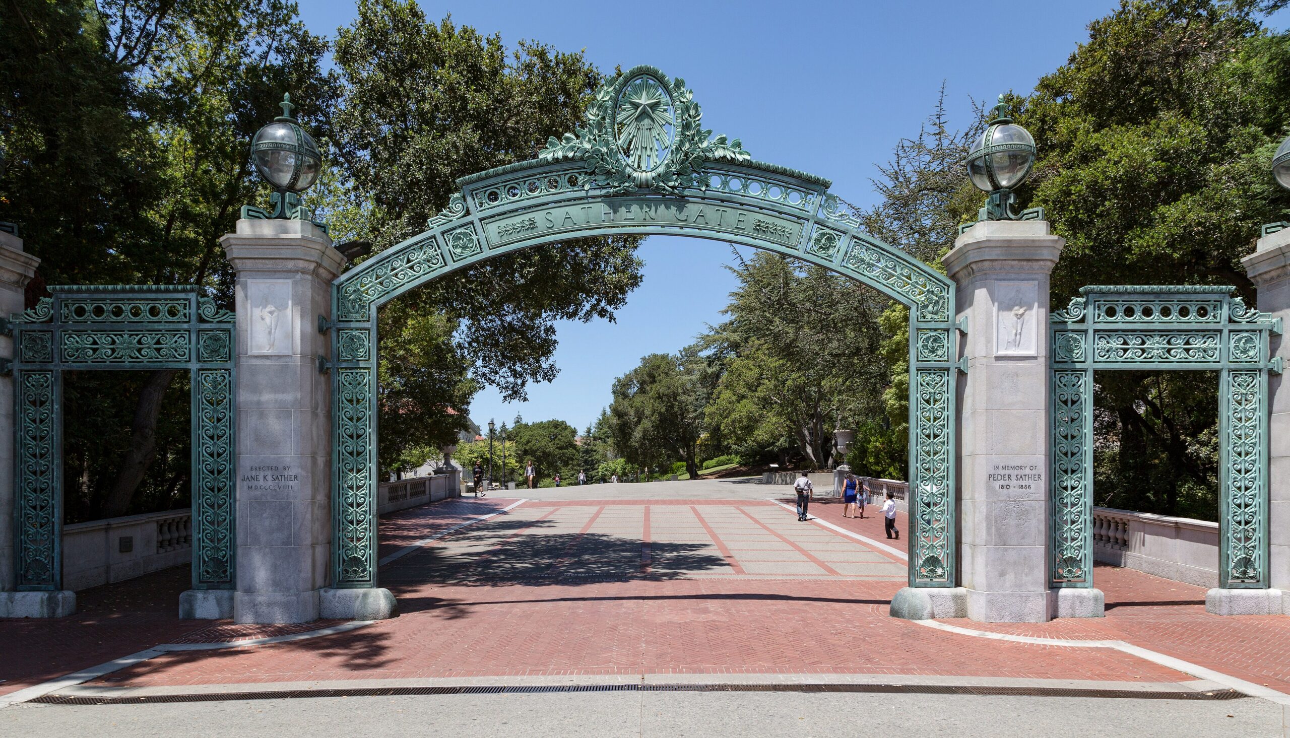 Students deciding which school to pick walking through Sather Gate at UC Berkeley