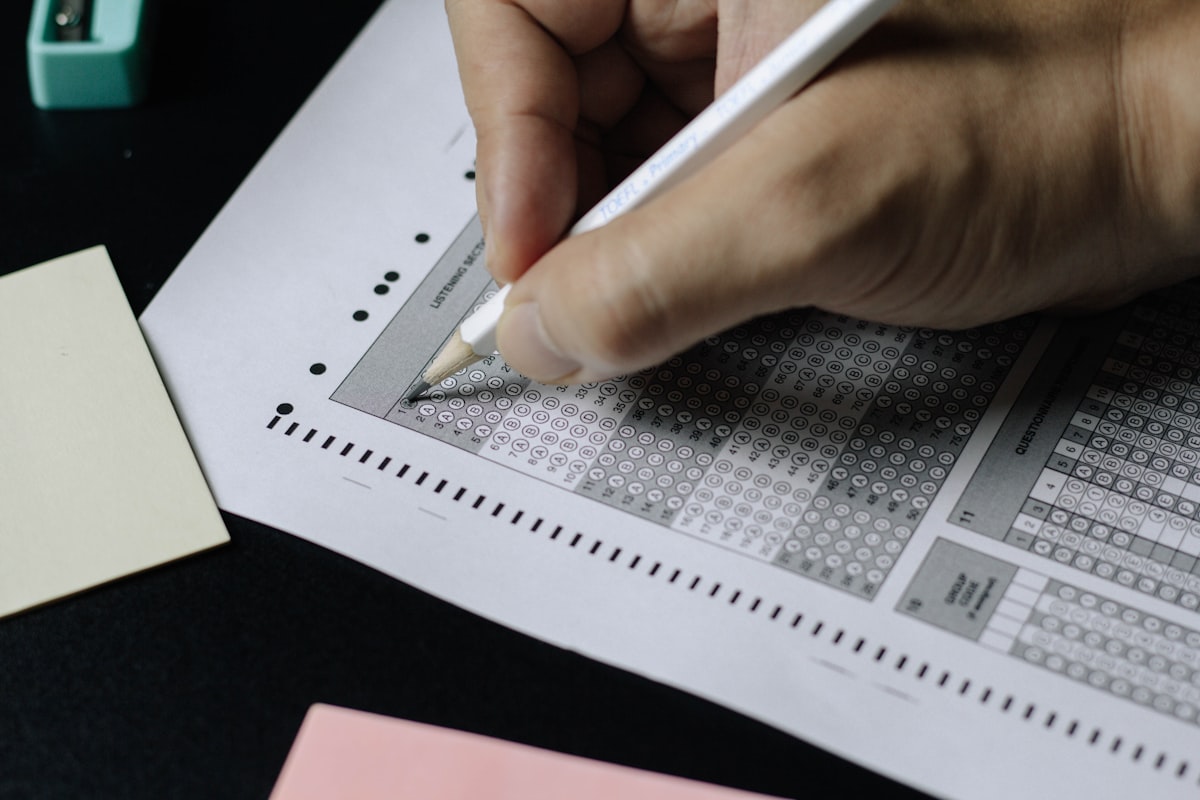 Student preparing for SAT vs ACT standardized testing for college admissions 2026