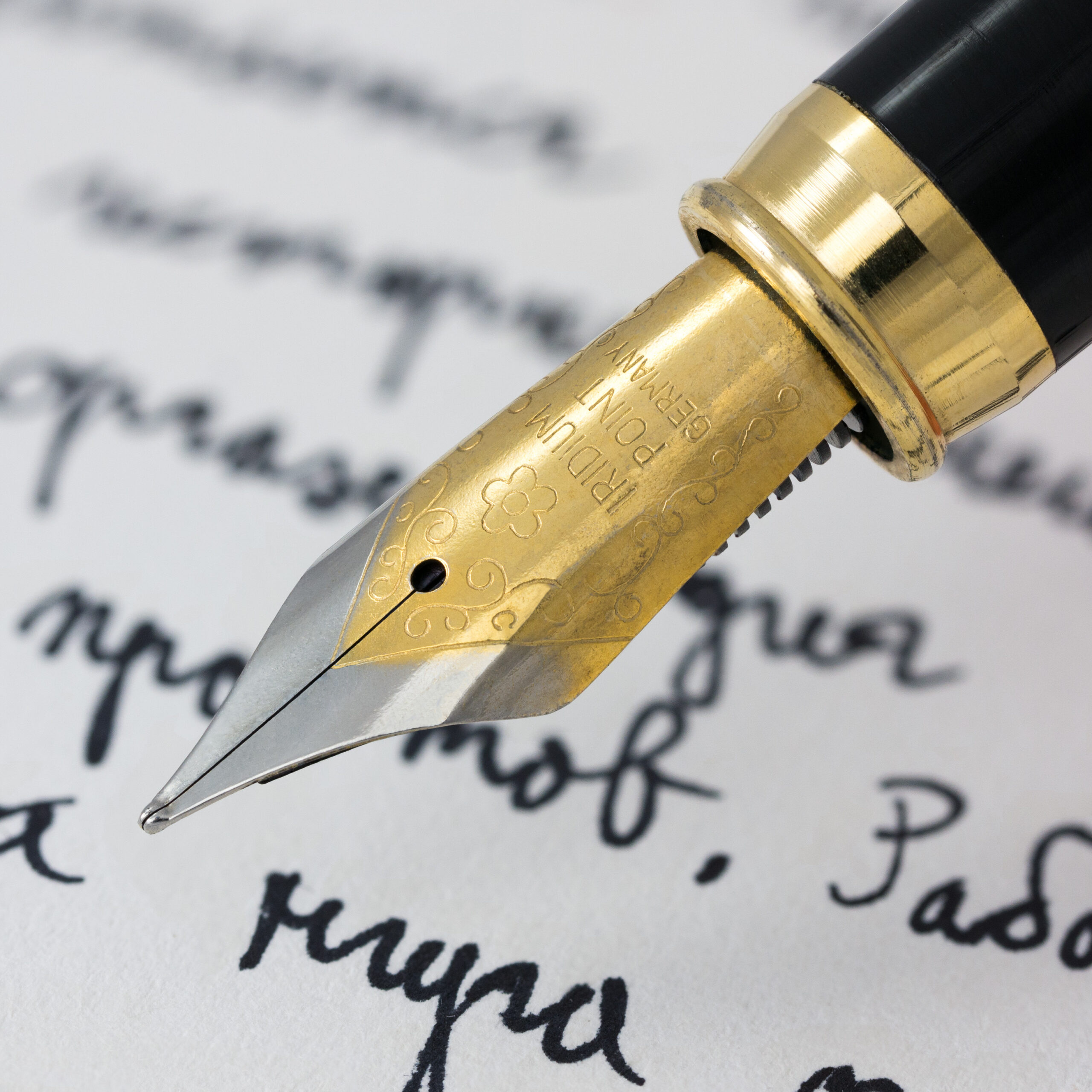 Fountain pen writing on paper representing the John Locke Essay Competition