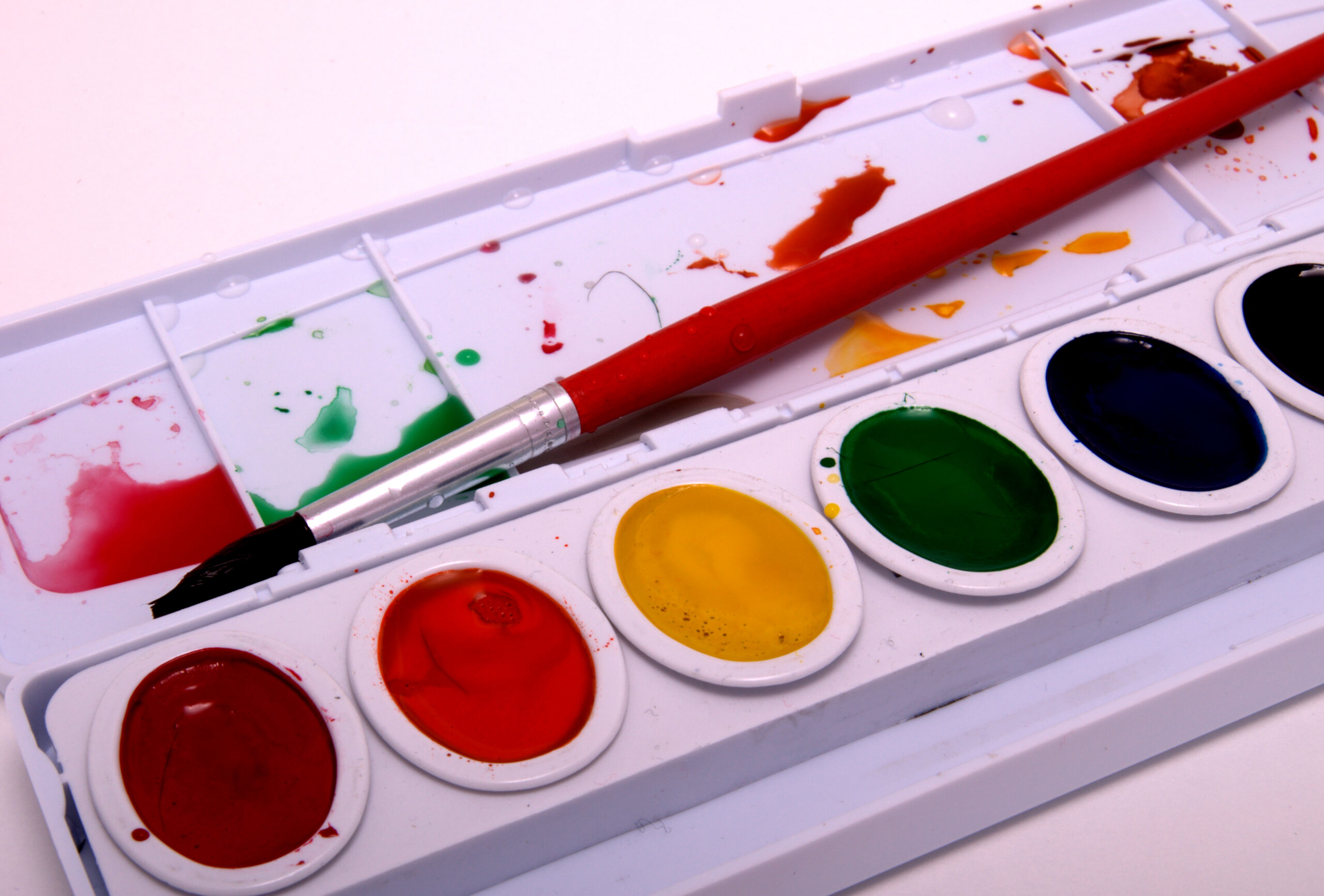 Watercolor paint set representing the Scholastic Art and Writing Awards