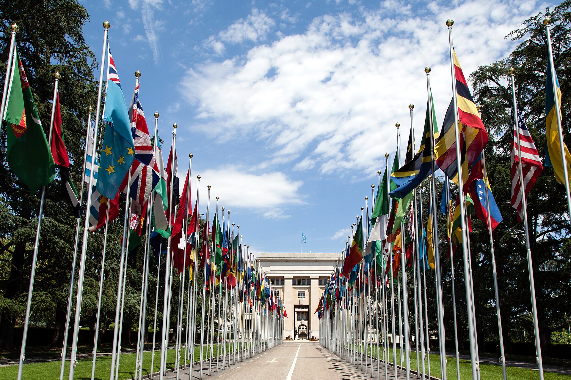 Member state flags along the Allée des Nations in front of the Palace of Nations, the United Nations Office at Geneva